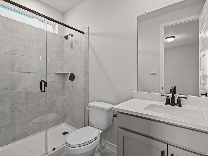 Furnished interior view inside a new home in Potranco Oaks, Castroville (Image 17).