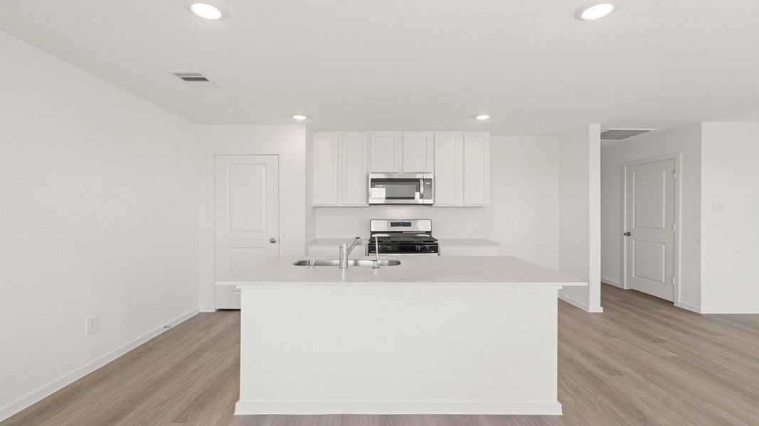 Furnished interior view inside a new home in Sunterra Lakes, Brookshire (Image 7).