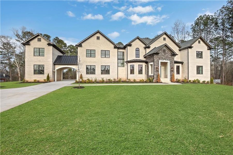 Front exterior of a new home in , Milton, GA, highlighting curb appeal (Image 34). Front exterior of a new home in , Milton, GA, highlighting curb appeal (Image 34).