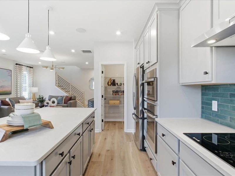 Representative furnished interior of a home built from the Cardinal by Tri Pointe Homes in Ellis Townes, Charlotte (Image 6).