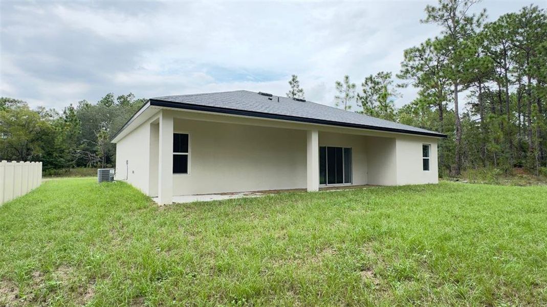 Front exterior of a new home in , Citrus Springs, FL, highlighting curb appeal (Image 16).