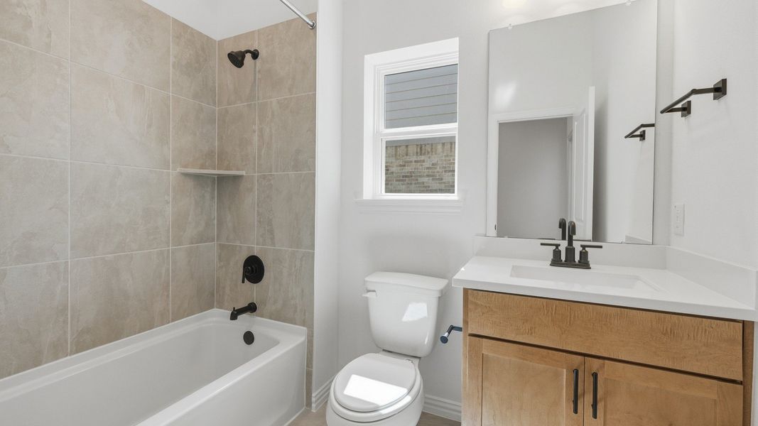 Furnished interior view inside a new home in Grand Magnolia, Magnolia (Image 9).