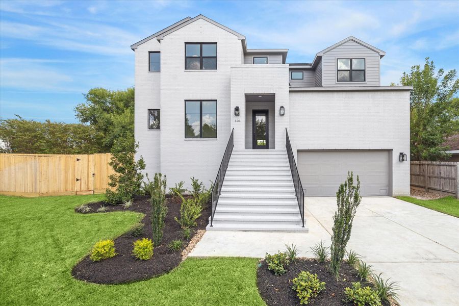 Front exterior of a new home in , Bellaire, TX, highlighting curb appeal (Image 10).