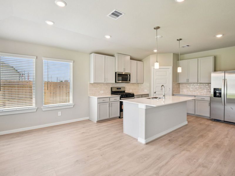 Furnished interior view inside a new home in Riviera Pines - Classic Series, Huffman (Image 3).