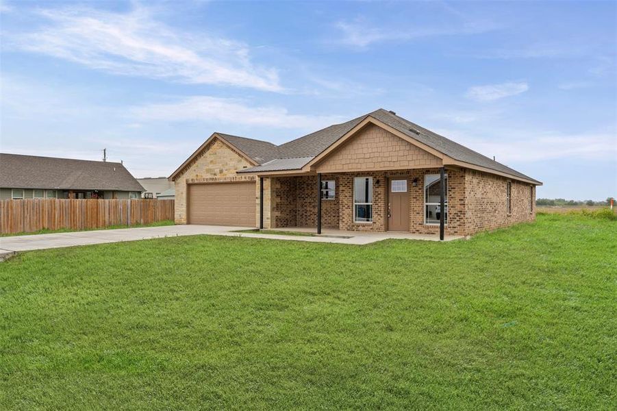 Front exterior of a new home in , Whitney, TX, highlighting curb appeal (Image 15).