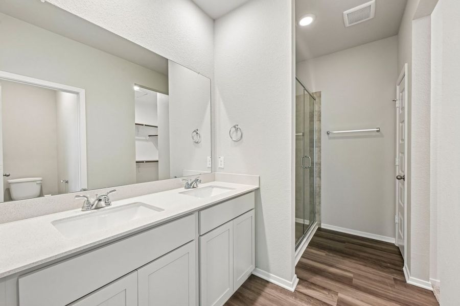 Furnished interior view inside a new home in Sorella, Tomball (Image 8).