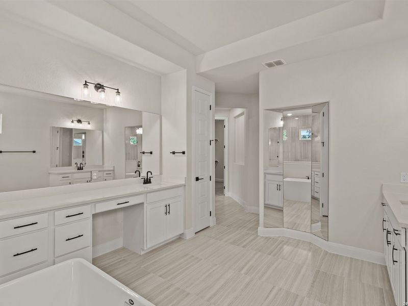Furnished interior view inside a new home in Potranco Oaks, Castroville (Image 15).
