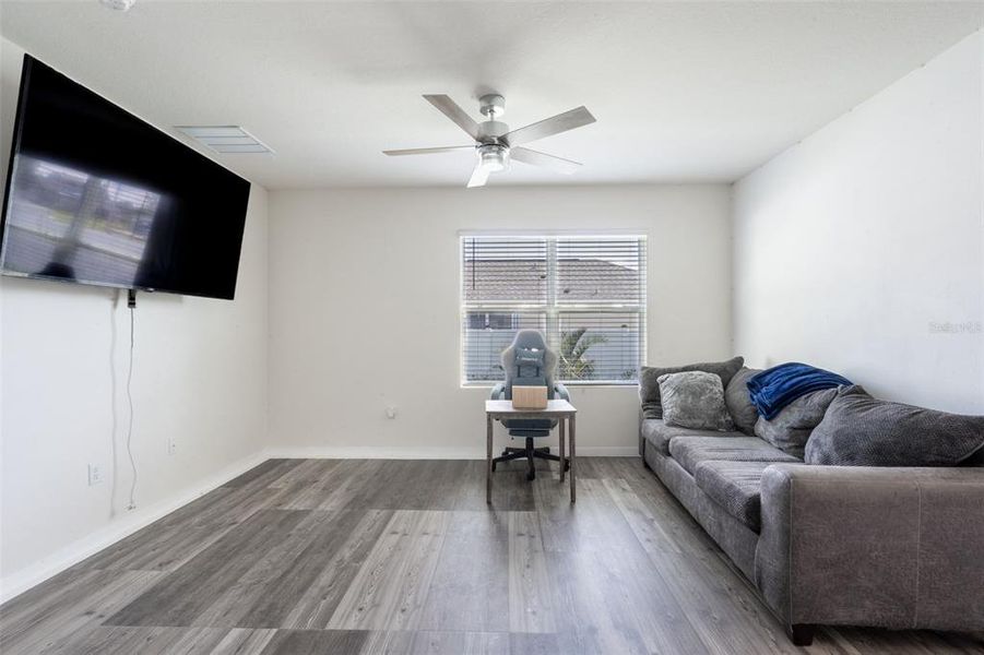 Furnished interior view inside a new home in Poinciana Enclave, Kissimmee (Image 13).