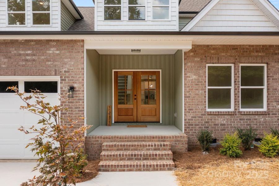 Front exterior of a new home in , Kannapolis, NC, highlighting curb appeal (Image 10). Front exterior of a new home in , Kannapolis, NC, highlighting curb appeal (Image 10).