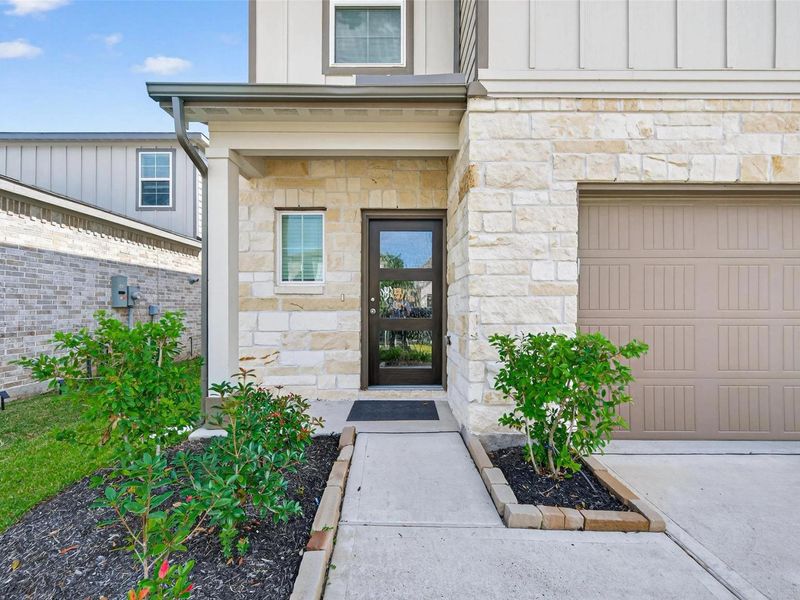 Exterior details and patio area of a home in Lakes at Black Oak, Magnolia (Image 2). Exterior details and patio area of a home in Lakes at Black Oak, Magnolia (Image 2).