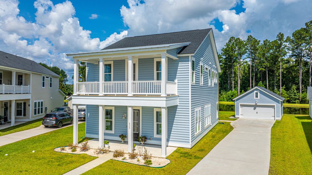Front exterior of a new home in , Summerville, SC, highlighting curb appeal (Image 20).