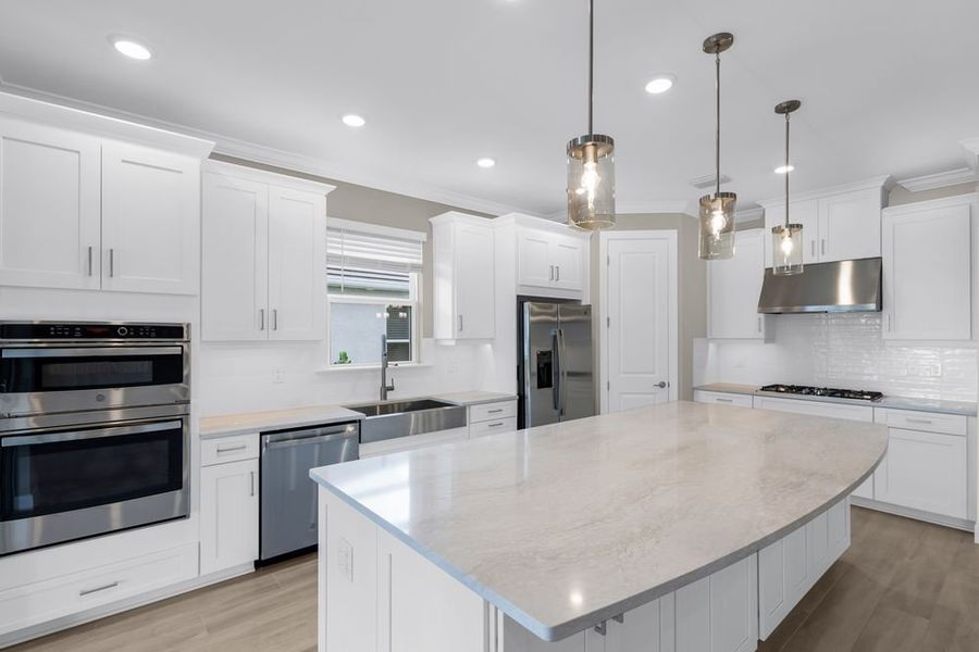 Furnished interior view inside a new home in Esplanade at Starling, Punta Gorda (Image 4).
