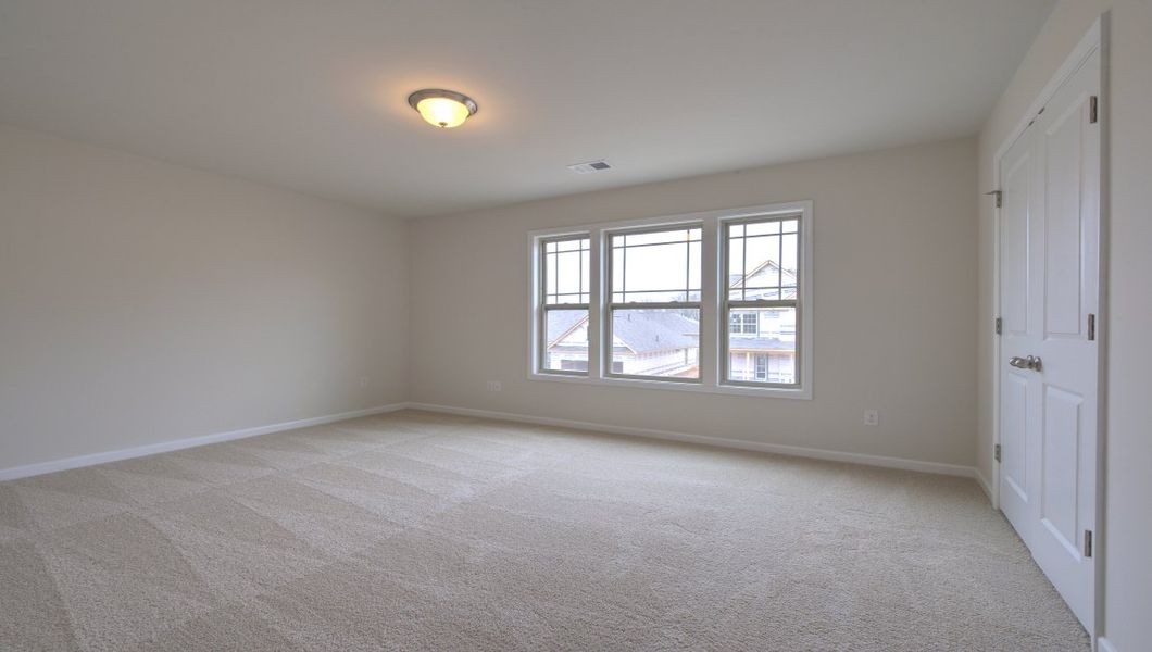 Spacious, unfurnished interior of a new home in Reserve at Tap Root Farms, Fletcher (Image 33).