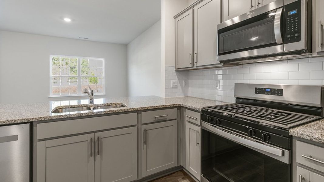 Furnished interior view inside a new home in Clock Road Townhomes, New Bern (Image 8).