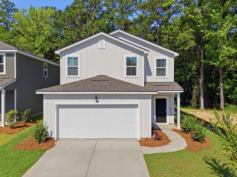 Front exterior of a new home in Grand Arbor, Blythewood, SC, highlighting curb appeal (Image 17).