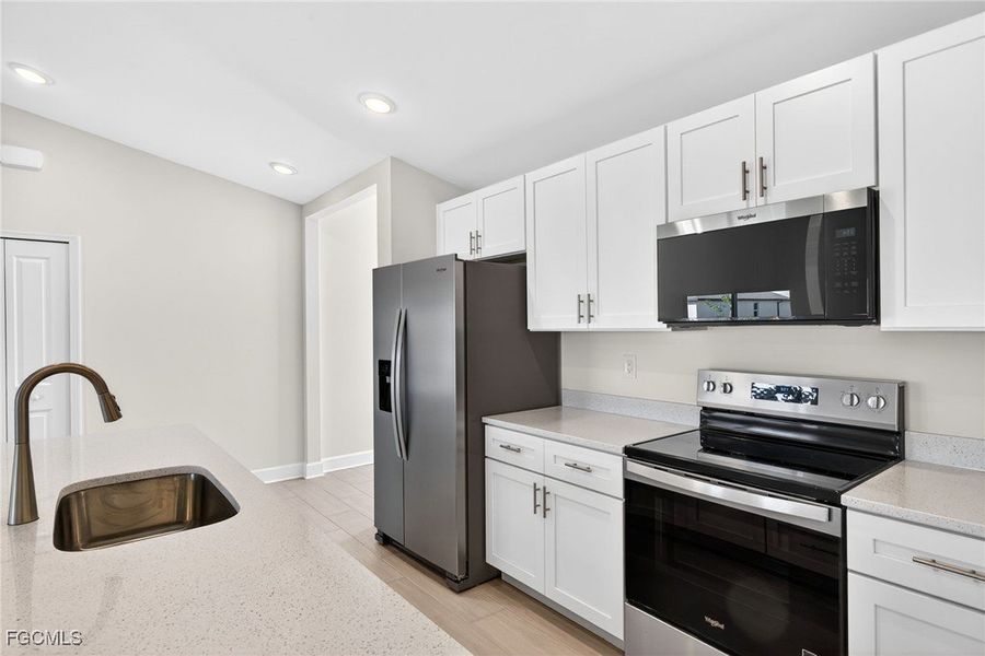 Furnished interior view inside a new home in Cape Coral, Cape Coral (Image 12). Furnished interior view inside a new home in Cape Coral, Cape Coral (Image 12).