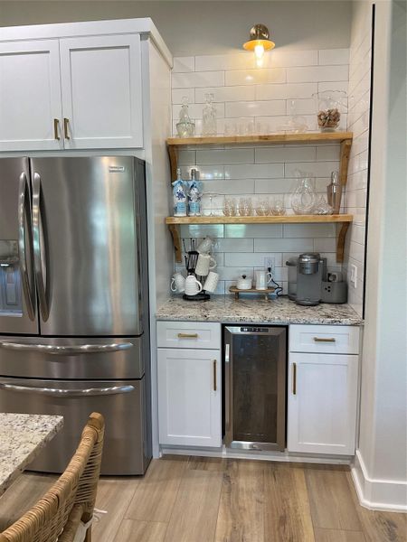 bar area with wine fridge