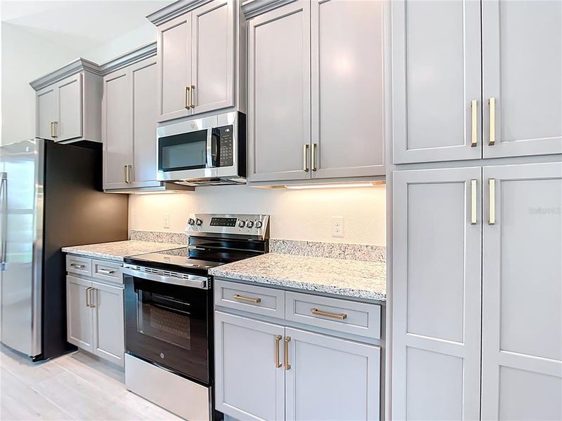 Furnished interior view inside a new home in , Port Charlotte (Image 12).
