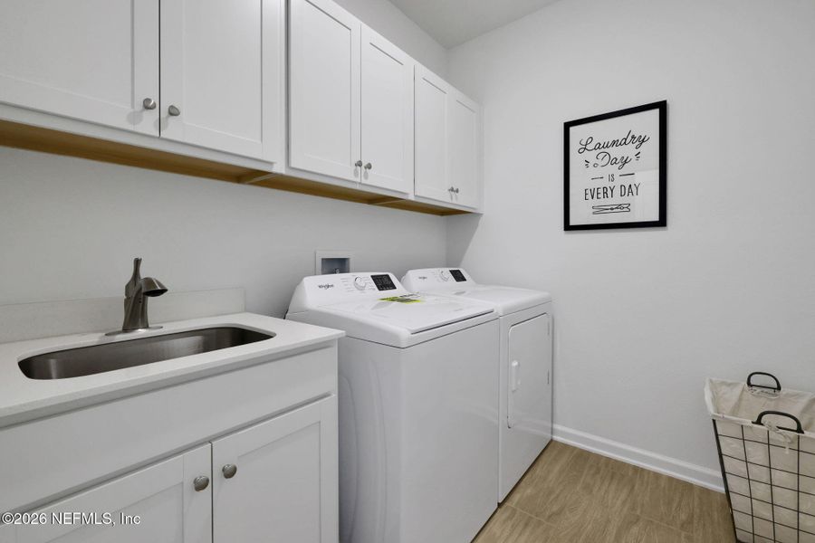 Furnished interior view inside a new home in Seminole Trace, Palm Coast (Image 45).