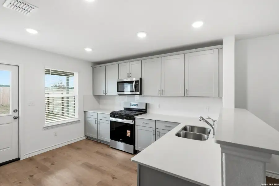 Furnished interior view inside a new home in Vista Real, Converse (Image 6).
