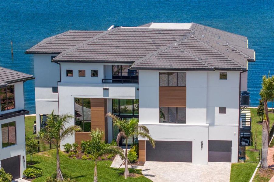 Front exterior of a new home in , St. Petersburg, FL, highlighting curb appeal (Image 18).