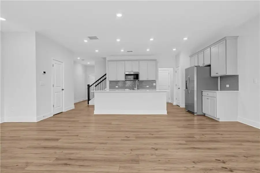 Spacious, unfurnished interior of a new home in Towns at Holly Springs, Holly Springs (Image 18). Spacious, unfurnished interior of a new home in Towns at Holly Springs, Holly Springs (Image 18).