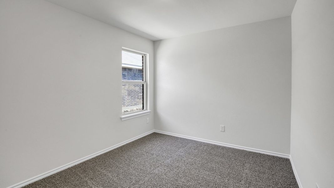 Spacious, unfurnished interior of a new home in Stonewyck Farms, Ennis (Image 13).