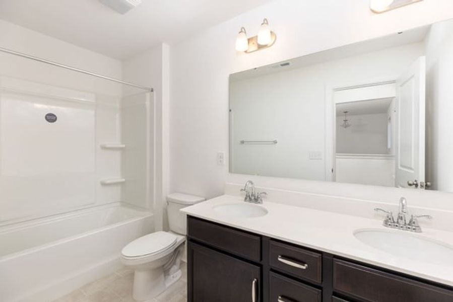 Representative furnished interior of a home built from the Calhoun by True Homes in Gatehouse Manor, Winston-Salem (Image 22).