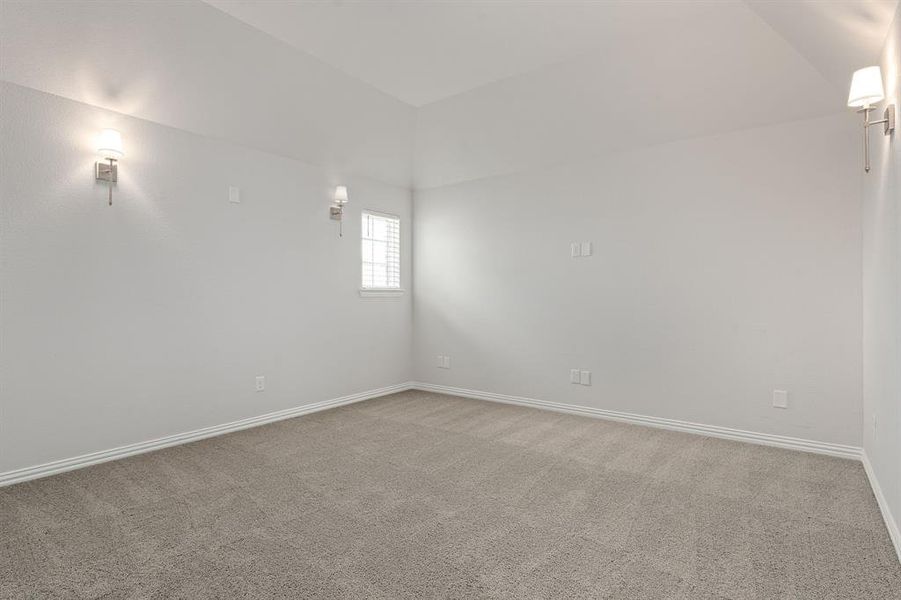 Large media room with walk in closet