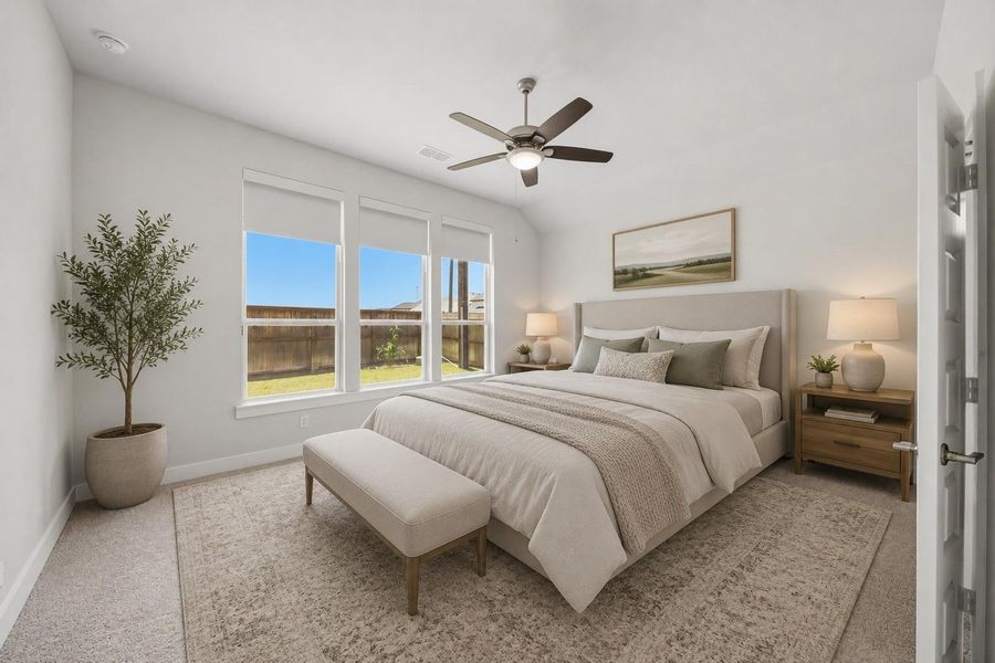 Private primary suite offering comfort, space, and backyard views. *Photo is virtually staged* Private primary suite offering comfort, space, and backyard views. *Photo is virtually staged*
