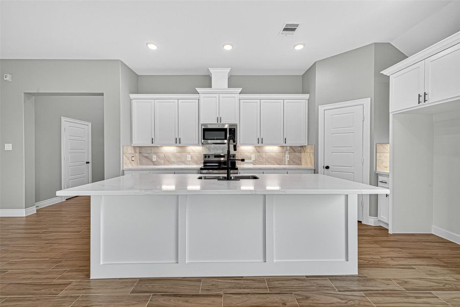Furnished interior view inside a new home in , Prairie View (Image 8).