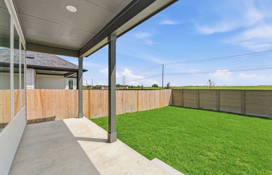 Exterior details and patio area of a home in Kuempel Farms, Pflugerville (Image 25).