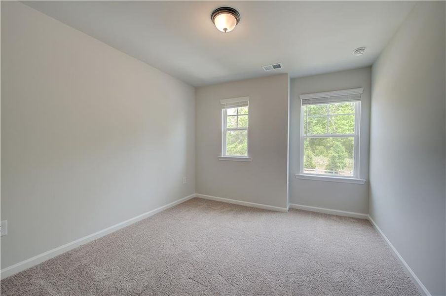 Spacious, unfurnished interior of a new home in Avery Landing, McDonough (Image 12).