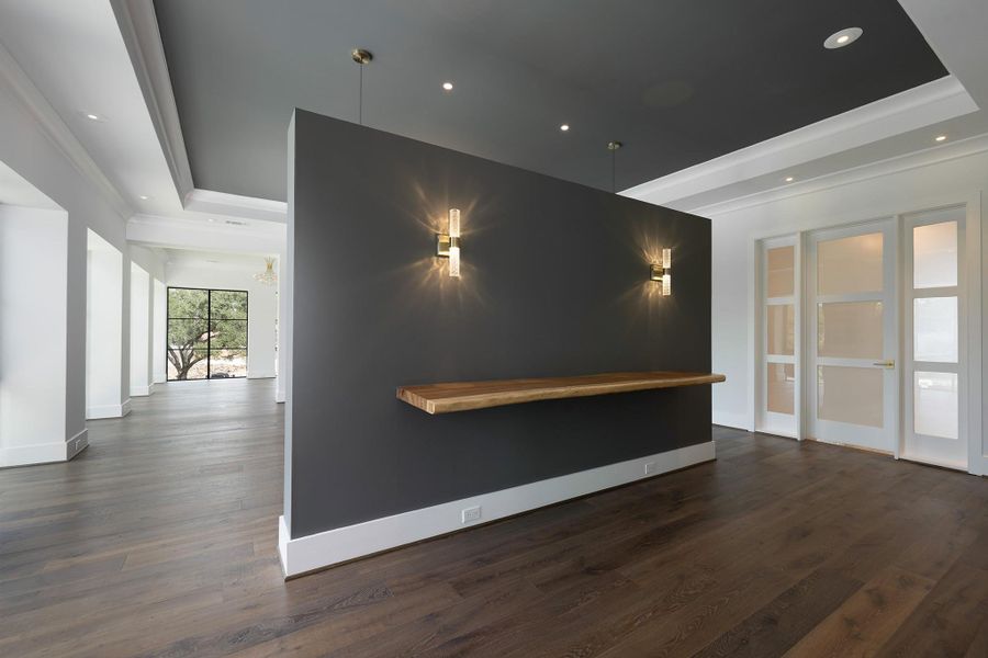 Looking into the entrance of the primary suite from the 2nd floor hallway.