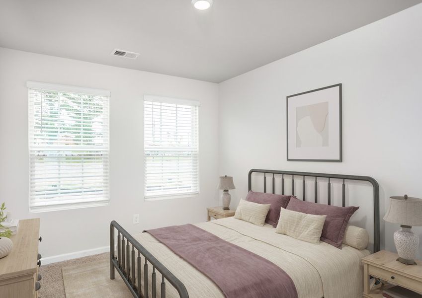 The master bedroom has enough space for your king-sized furniture