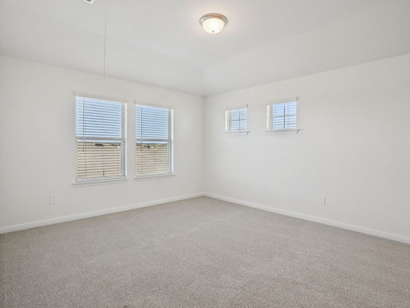 Spacious, unfurnished interior of a new home in Legendary Trails - Premier Series, Cibolo (Image 32).