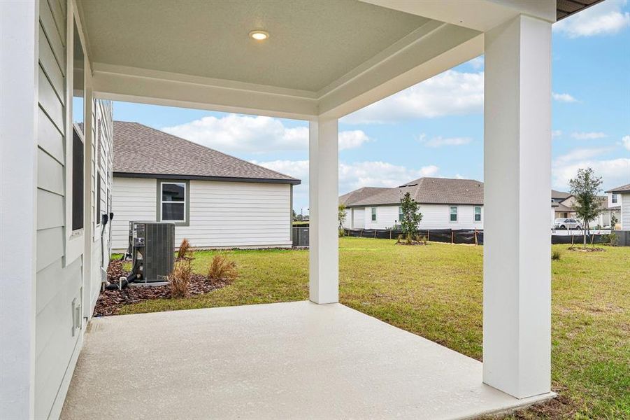 Exterior details and patio area of a home in Trailside, Mount Dora (Image 4).