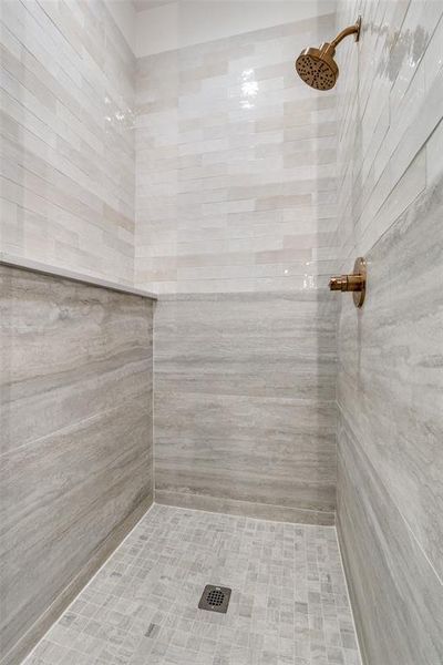 Bathroom with a tile shower