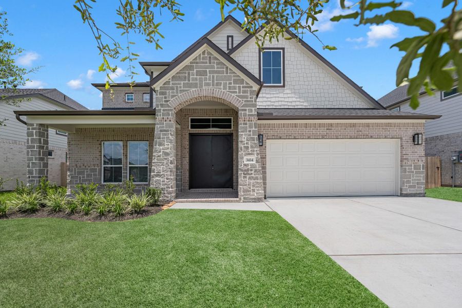 Front exterior of a new home in Briarwood Crossing, Rosenberg, TX, highlighting curb appeal (Image 20). Front exterior of a new home in Briarwood Crossing, Rosenberg, TX, highlighting curb appeal (Image 20).