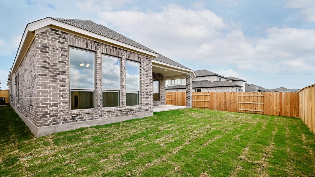 Exterior details and patio area of a home in Crosswinds, Kyle (Image 4).