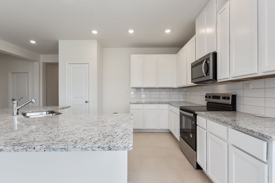 Furnished interior view inside a new home in Hidden Bluffs at TRP, San Antonio (Image 3).