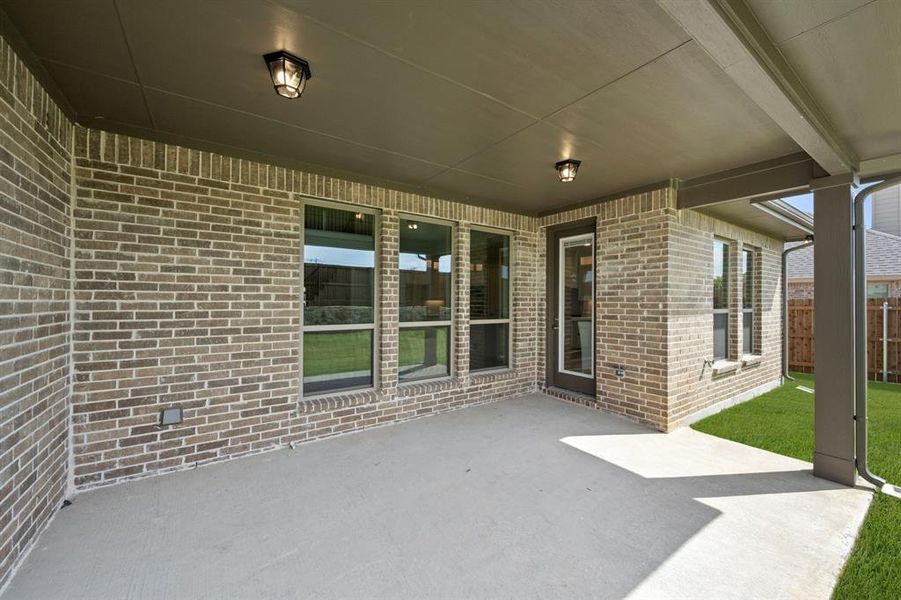 Exterior details and patio area of a home in Somerset - Phase 5, Mansfield (Image 3). Exterior details and patio area of a home in Somerset - Phase 5, Mansfield (Image 3).