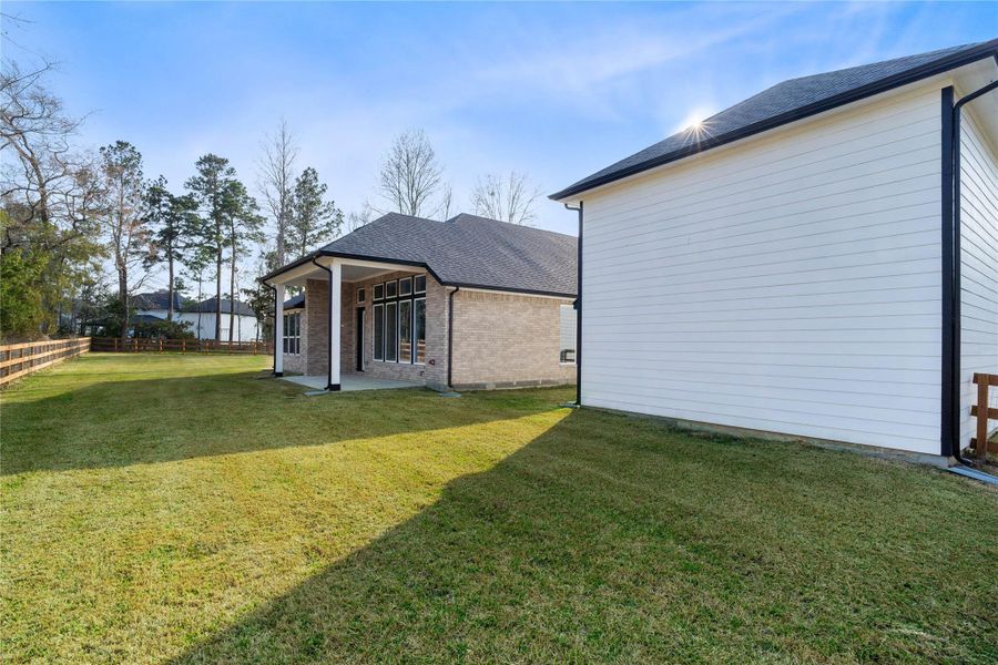 From the covered patio to the additional Oversized Garage. From the covered patio to the additional Oversized Garage.
