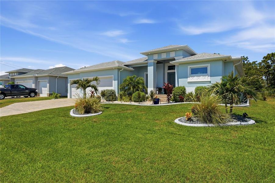 Front exterior of a new home in , Rotonda West, FL, highlighting curb appeal (Image 21).