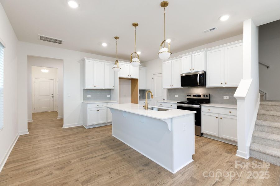 Furnished interior view inside a new home in , Charlotte (Image 6).