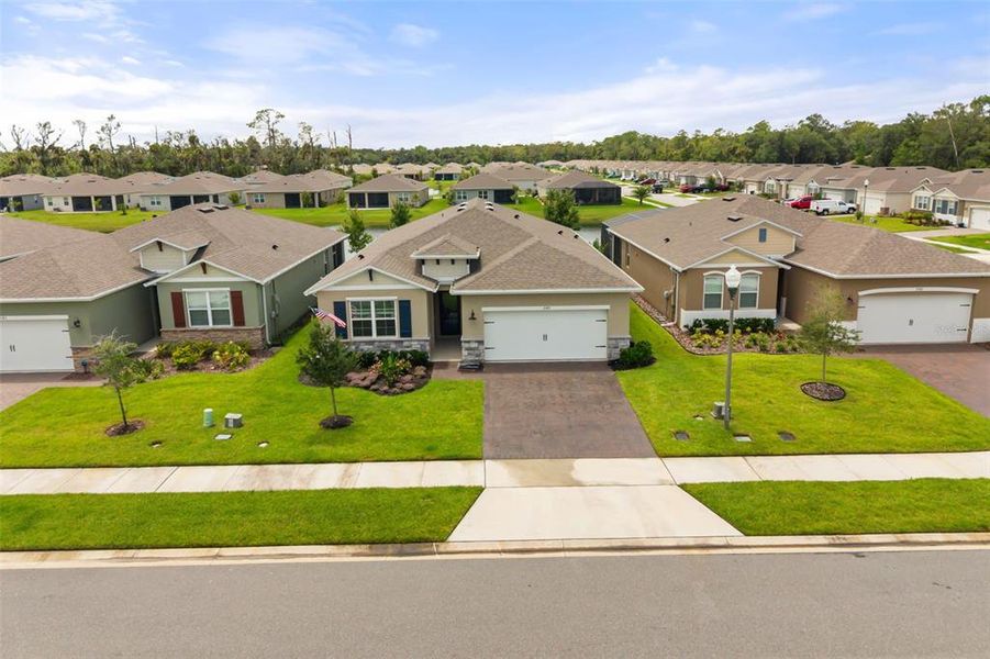 Front exterior of a new home in , New Smyrna Beach, FL, highlighting curb appeal (Image 2). Front exterior of a new home in , New Smyrna Beach, FL, highlighting curb appeal (Image 2).