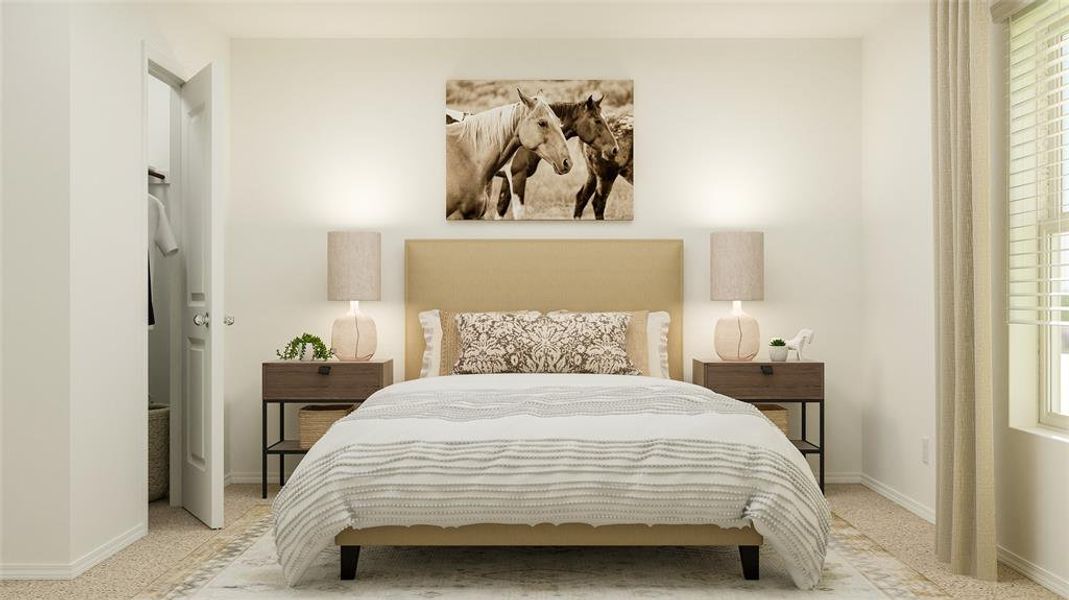 Bedroom featuring light colored carpet