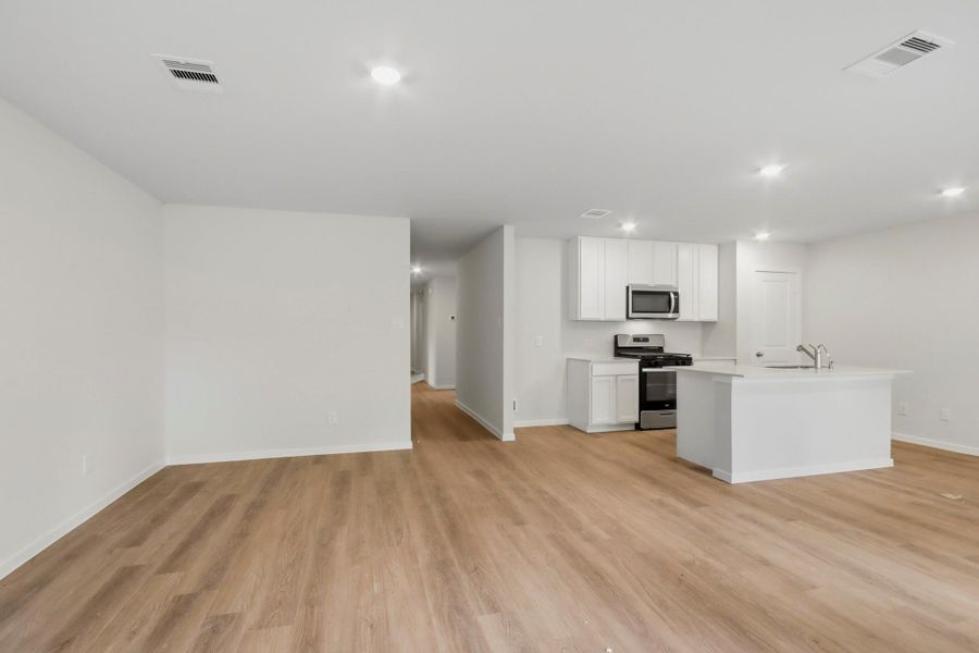 Spacious, unfurnished interior of a new home in New Waverly Station, New Waverly (Image 11). Spacious, unfurnished interior of a new home in New Waverly Station, New Waverly (Image 11).