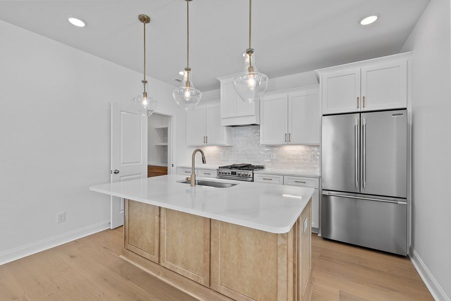 Representative furnished interior of a home built from the The Juniper by RobuckHomes in Kennebec Crossing, Angier (Image 7).