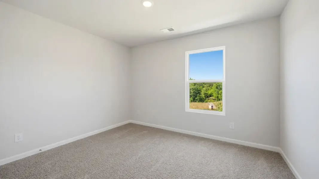 Representative unfurnished interior of a home built from the Penwell by D.R. Horton in Branford Crossing, Stockbridge (Image 25).